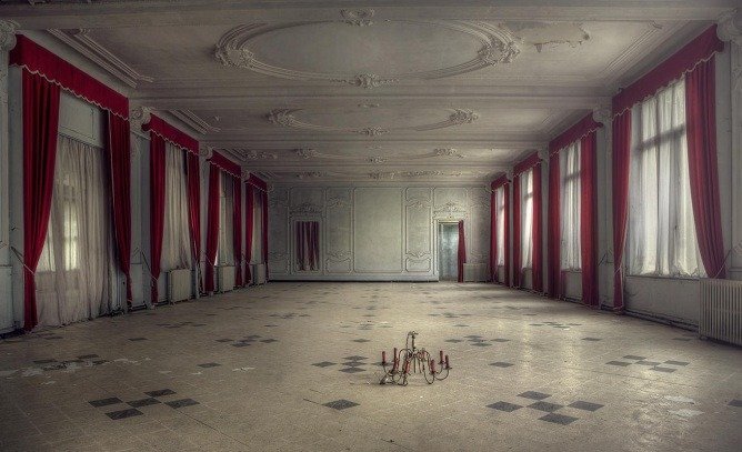 An abandoned hotel’s ballroom.