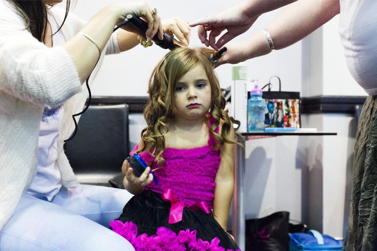 2.'Sparkle, Baby' explores girl culture in Australia within the phenomena of beauty pageants, particularly those directed at the young. Through documenting child pageants, photographer Chloe Bartram sought to understand if participating in these events increases the pressure on young girls to conform to an idealized view of what it means to be female or rather, is it a celebration of girlhood? (Chloe Bartram/Sony World Photography Awards)