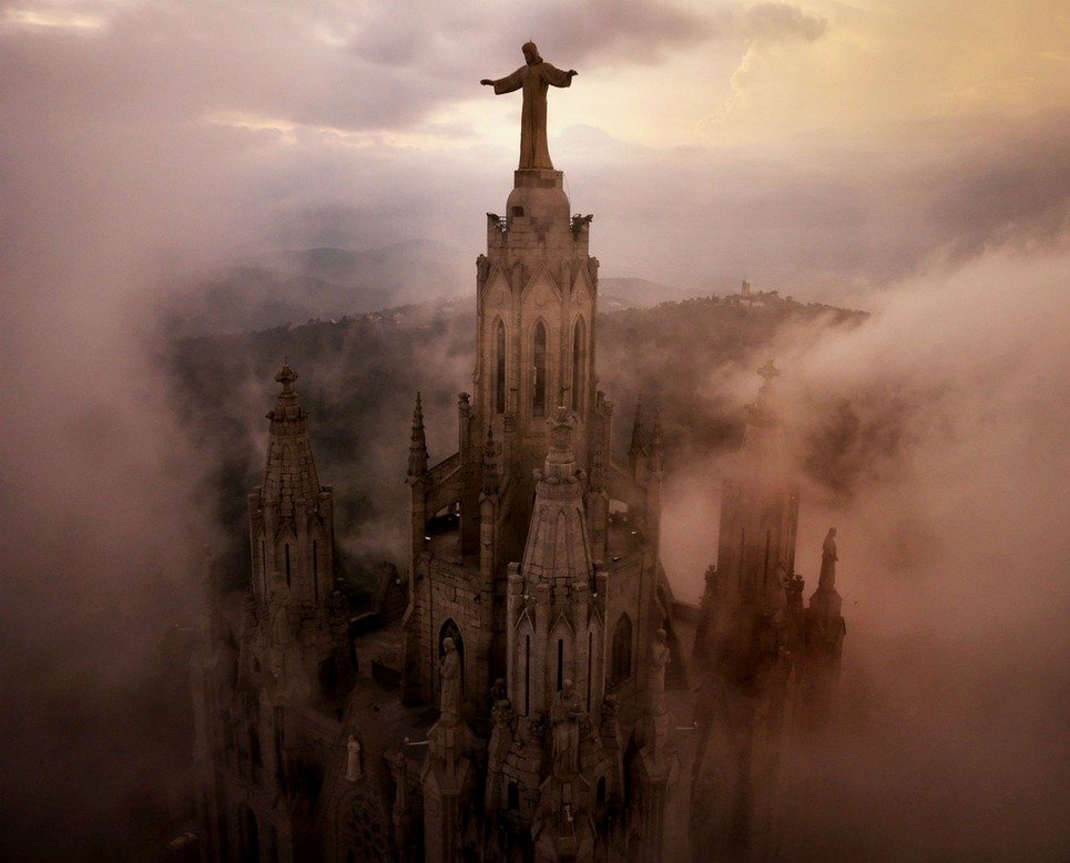 16. Clouds surround the the Temple Expiatori del Sagrat Cor Church in Barcelona.