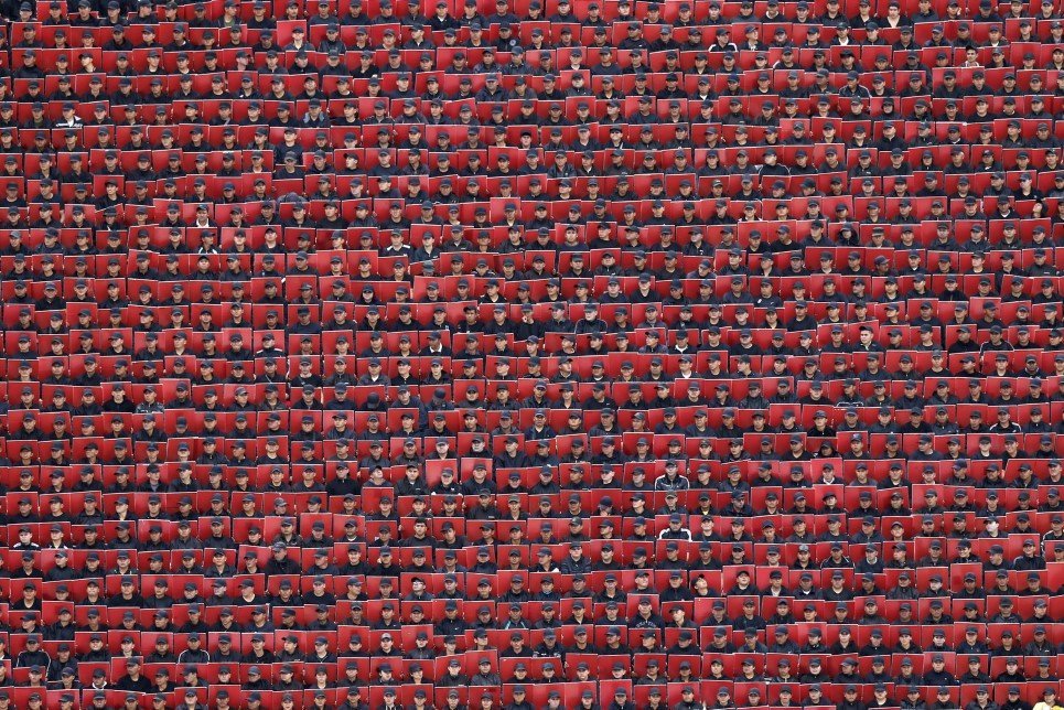 60. Troops hold colored cards during a military parade celebrating Independence Day in downtown Mexico City - September 16, 2014.