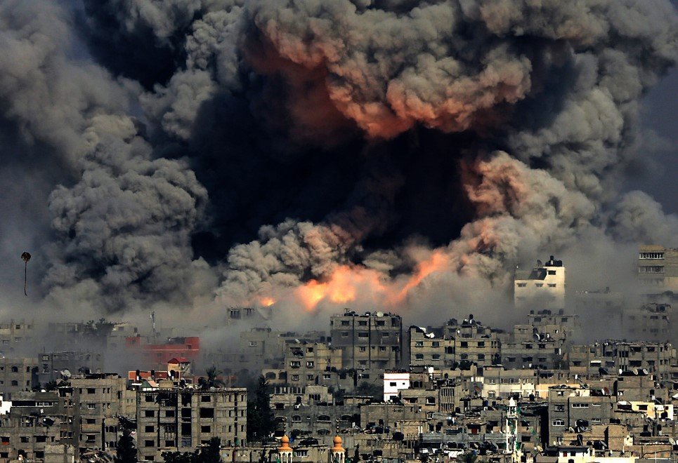64. Smoke rises after Israeli air strikes in Gaza City - July 29, 2014.