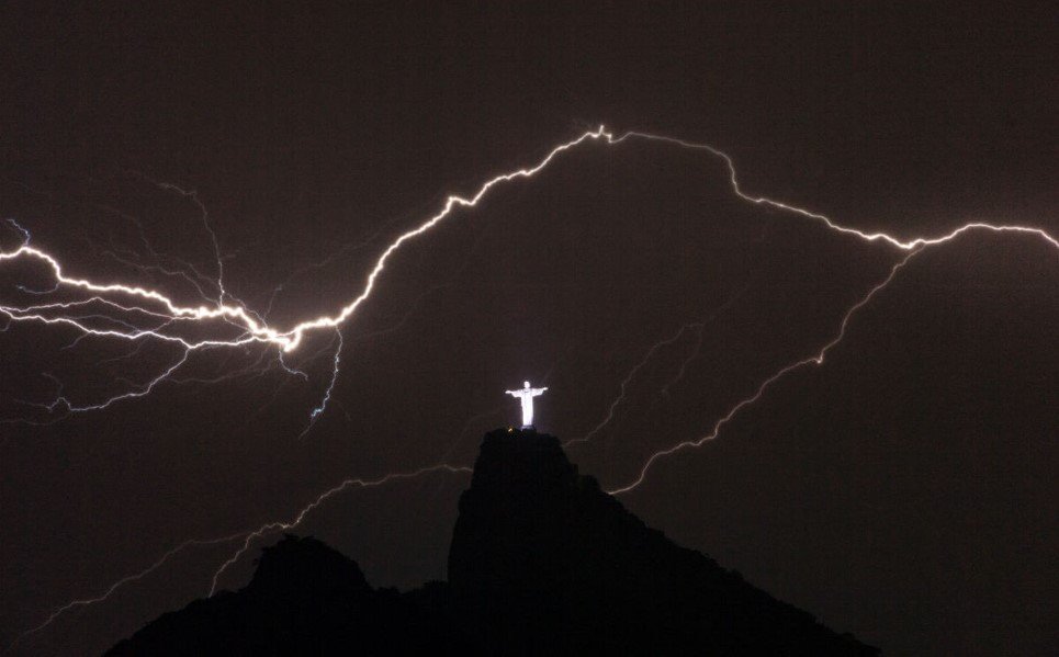 7. Lightning flashing on the top of Corcovado Hill in Rio de Janeiro - January 14, 2014.
