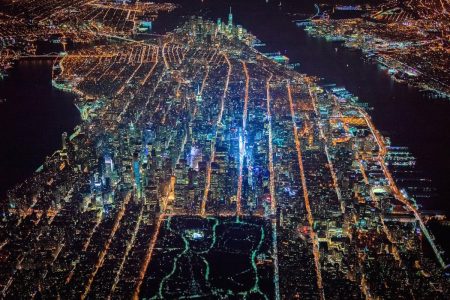 A rare and stunning look of New York City at night from an altitude of 7,500 feet