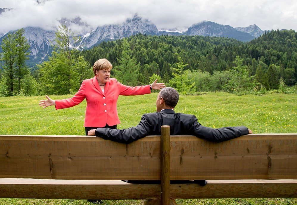 German chancellor Angela Merkel talks to U.S. president Barack Obama in Elmau, Germany – June 8, 2015.