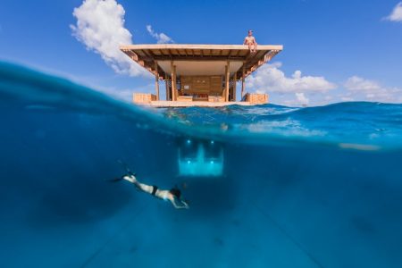 Sleep Beside Mesmerizing Coral Reef at Manta Resort’s Private Island