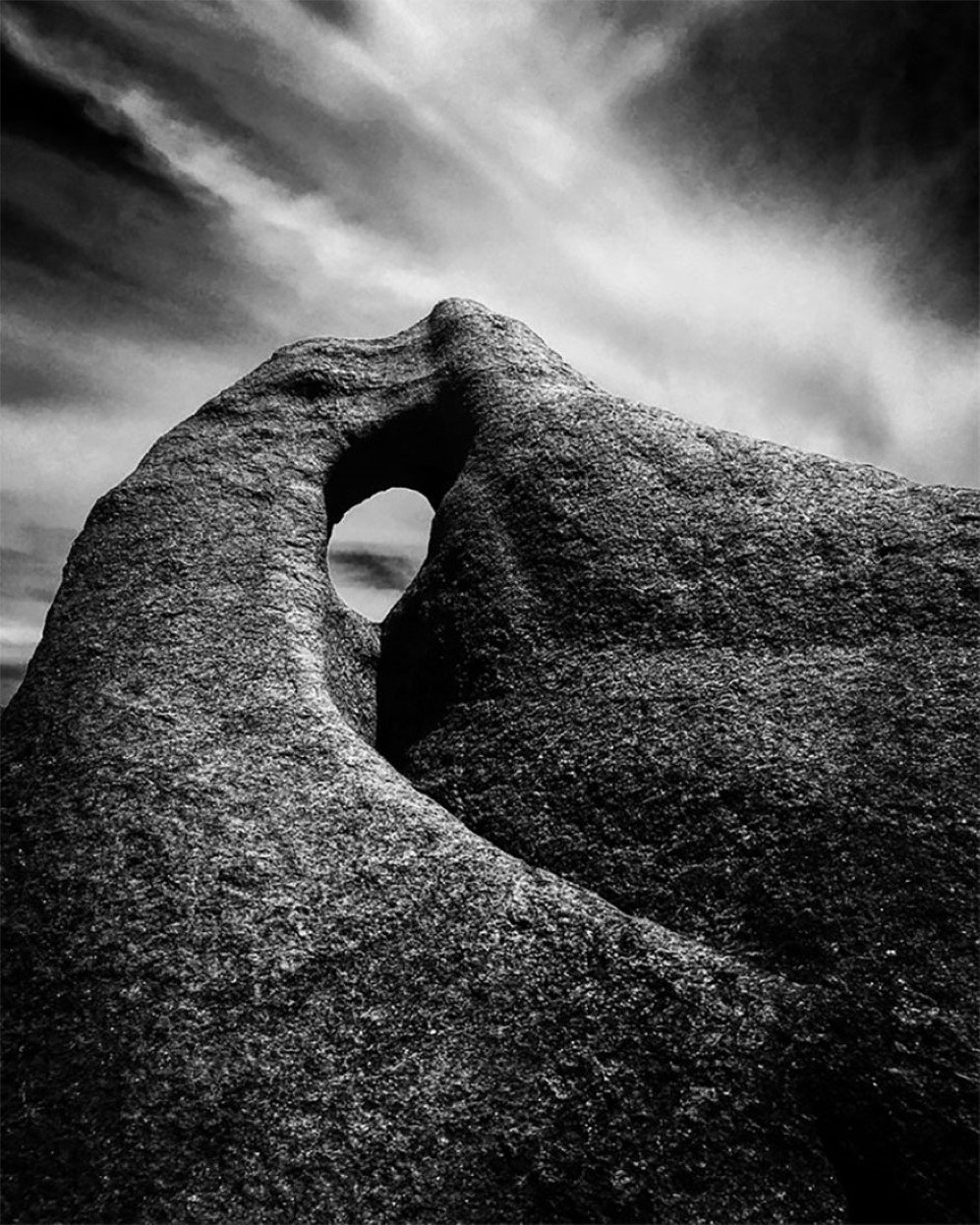 I captured this image in the Margaret River region of Western Australia.  It’s my second home, and one of the most spectacular places on earth.  This was taken on the coast at Wyadup Rocks, and is called Singing Rock.  I was swimming there with family when I was drawn to it by the sound of it’s song as the wind whistled through it, and just had to capture this image.