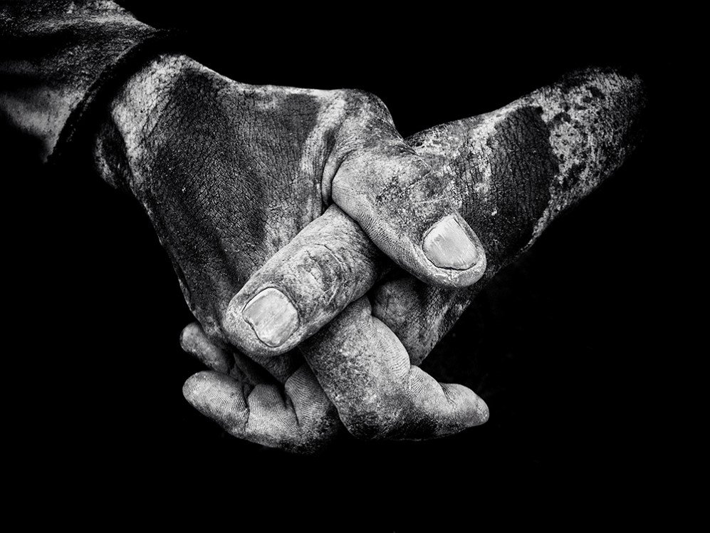 I shot this photo on an early morning photo walk around the docks in Jakarta in April 2016. These were the hands of a dock worker who was taking a break. I was struck by the texture created by the accumulated dirt on his hands.