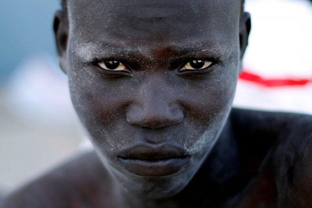 a migrant arrives at a naval base after he was rescued by libyan coastal guards in tripoli libya on november 6 2017