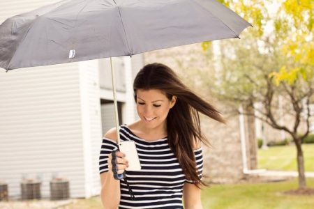 Texting while holding an umbrella got easier with Brolly Umbrella!