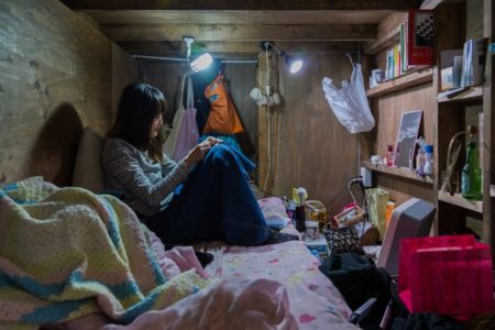 Won Kim’s disturbing photographs capture people living in micro rooms in Japan