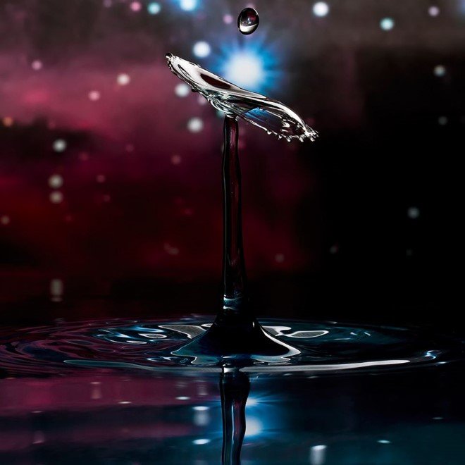 Looks like a water droplet with the city lights behind