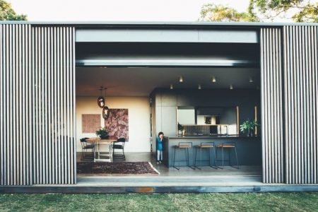 This eco-friendly Australian home slides open to the mesmerizing ocean view