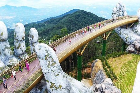 Giant pair of hands lift up this Vietnamese pedestrian bridge to heaven