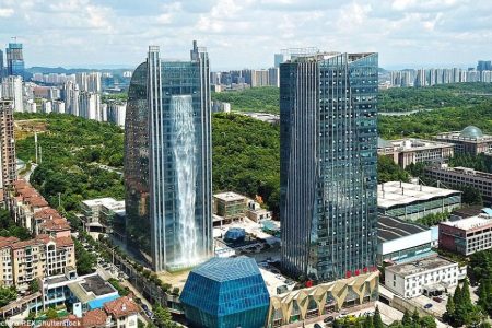 Chinese company takes everyone by surprise by building a 350ft Waterfall on a skyscrapper