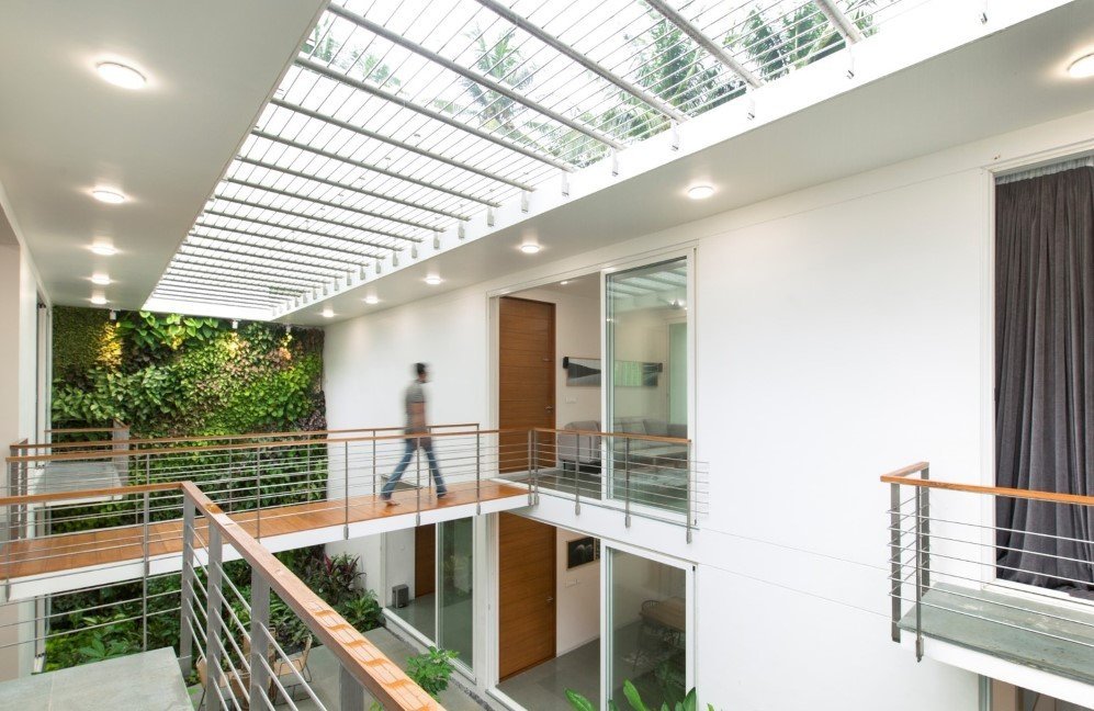 The Regimented House wrapped in greenery 10