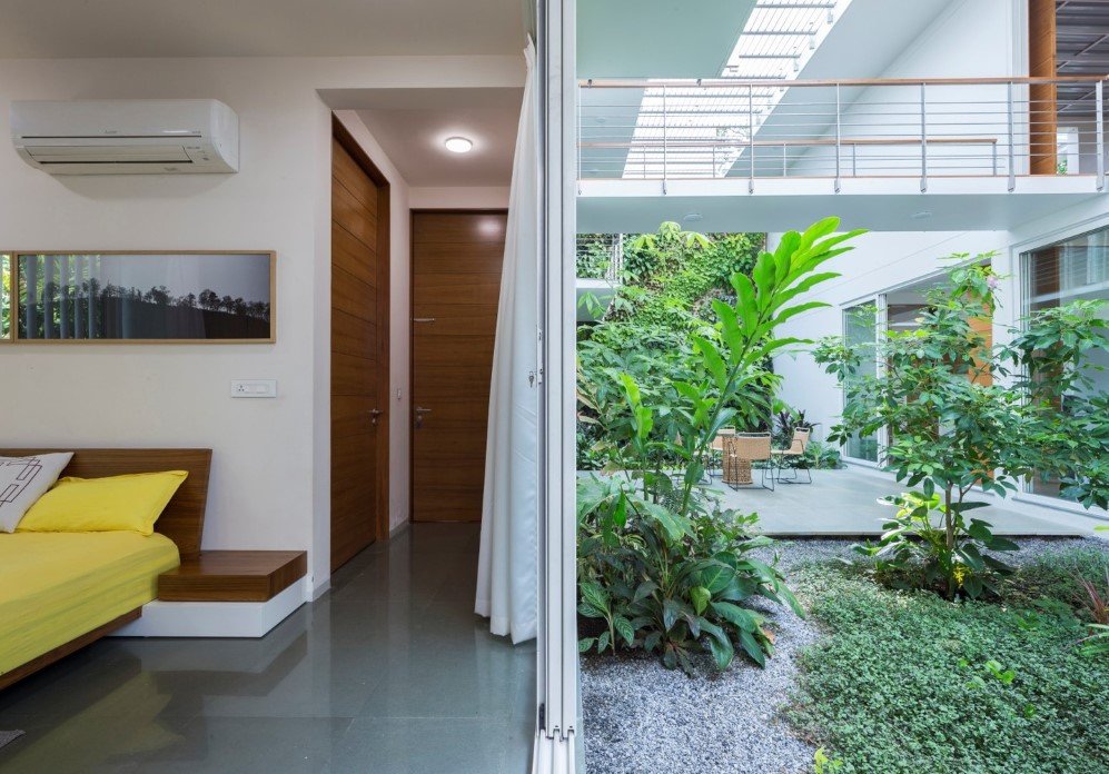 The Regimented House wrapped in greenery 14
