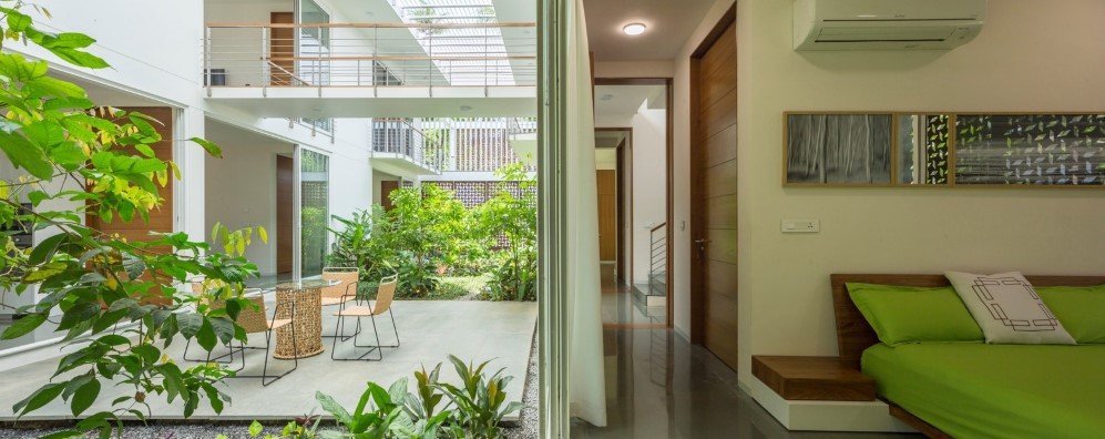 The Regimented House wrapped in greenery 15