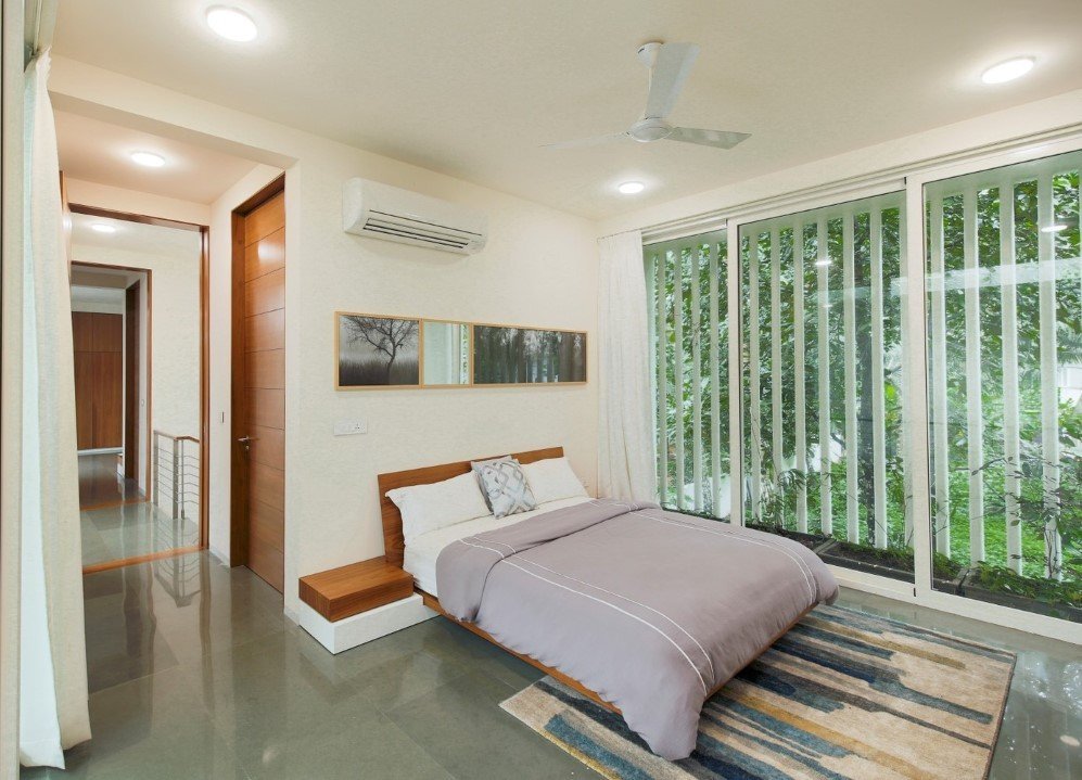 The Regimented House wrapped in greenery 18