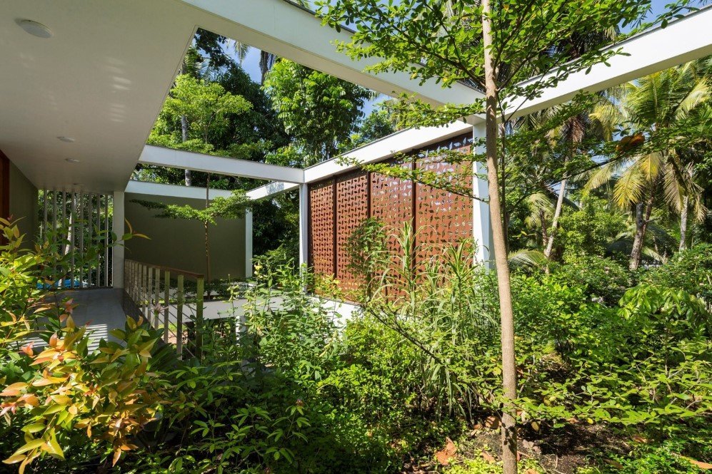 The Regimented House wrapped in greenery 21
