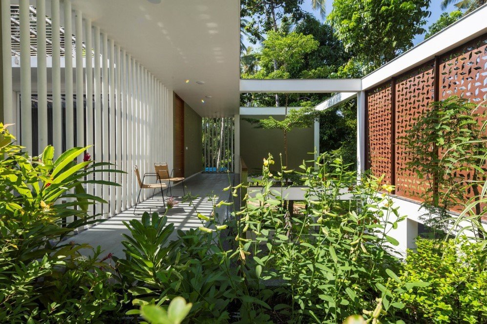 The Regimented House wrapped in greenery 22