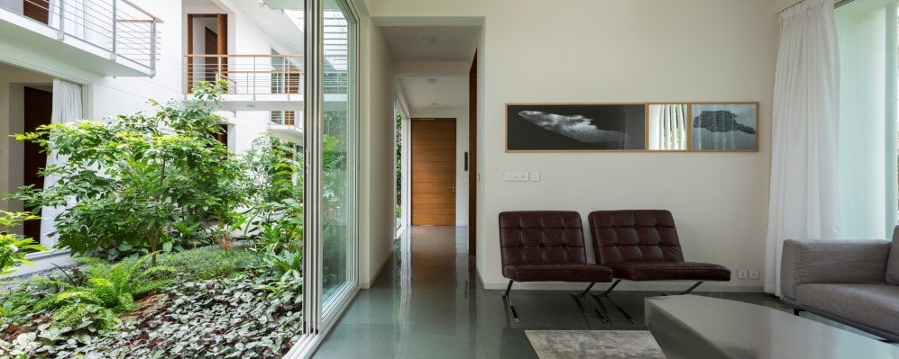 The Regimented House wrapped in greenery 5