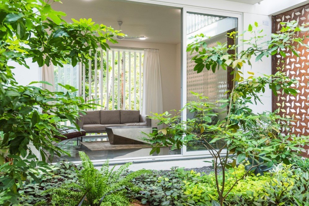 The Regimented House wrapped in greenery 6