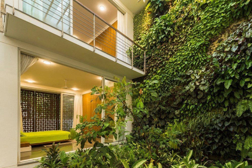 The Regimented House wrapped in greenery 8