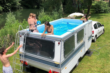 French artist made our summer dream come true with a mobile pool caravan