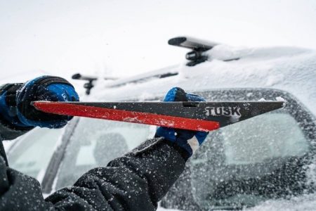 This multipurpose shovel can scoop snow, scrape ice and squeegee windows