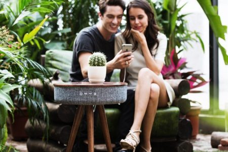 This side table is capable of turning your TV lounge into a home cinema