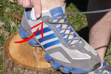 This is why you have an extra shoelace hole in your trainers!