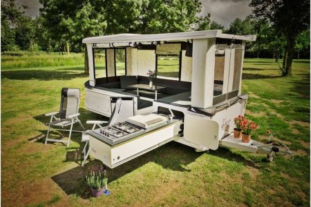 Shape-shifting camper trailer pops-up on a push of a button in 30 seconds