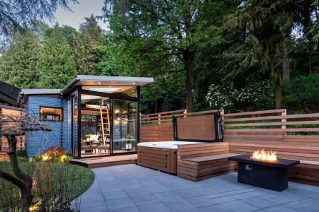 This home features a reading nook right in the backyard