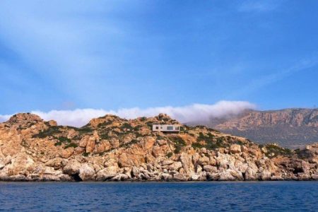 This concrete home is a contemporary Greek fantasy come true