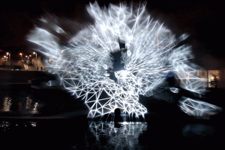 This geometric light projection work will take you to the world of outer space