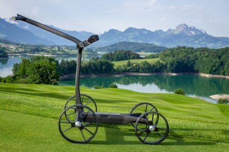 A smart golf e-trolley that adjusts its speed to keep up with its owner